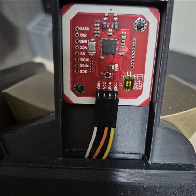 PN532 reader mounted in its enclosure slot